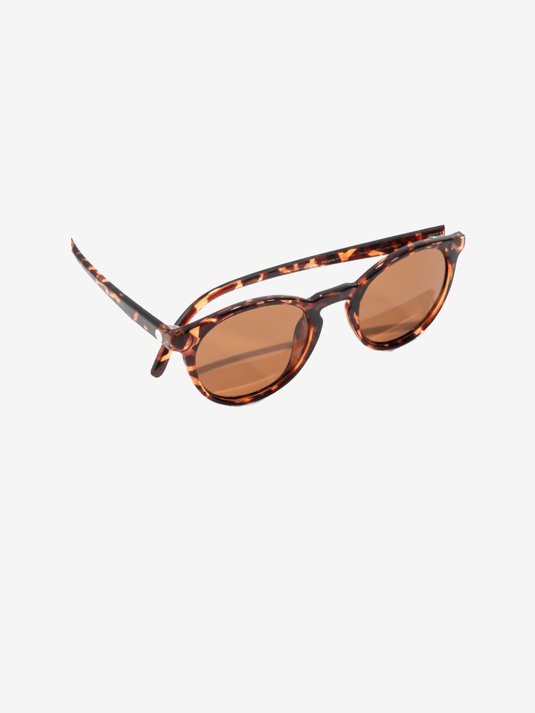 Dipsea tortoise round frame sunglasses by Sunski in brown, stylish eyewear blending city style with outdoor spirit