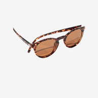 Dipsea tortoise round frame sunglasses by Sunski in brown, stylish eyewear blending city style with outdoor spirit
