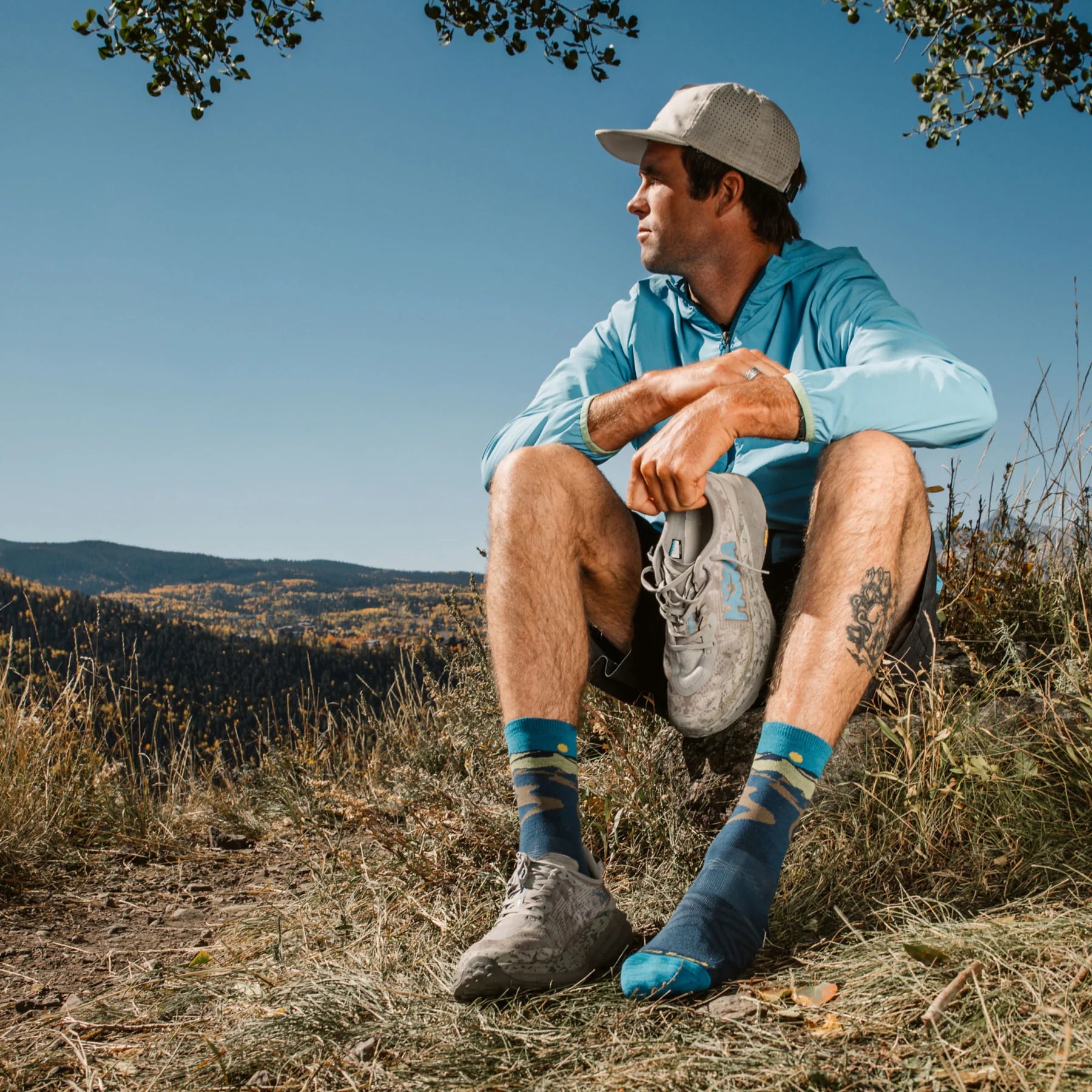 Ridge Runner Micro Crew Ultra Lightweight - Men by Darn Tough in blue and grey, moisture-wicking Merino wool socks for running and outdoor use