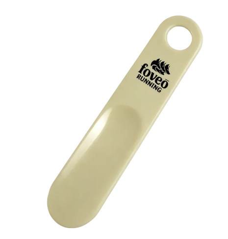 Foveo Running shoe horn in beige plastic with black Foveo Running logo and hanging hole