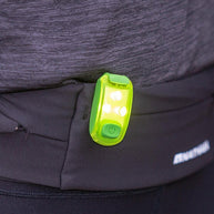 StrobeLight LED Safety Light Clip by Nathan in neon green, small lightweight LED clip for visibility and safety while running outdoors
