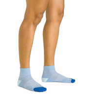 Darn Tough women's Run Quarter sock in Sky worn on feet, showing the quarter-height cuff