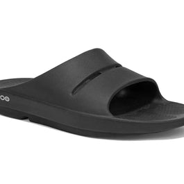 OOahh - Unisex by Oofos in black, lightweight slides with OOfoam strap for impact absorption and enhanced comfort, ideal for recovery and casual wear