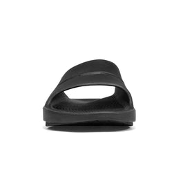 OOahh - Unisex by Oofos in black with agile OOfoam strap, shock-absorbing slides designed for all-day comfort and support.