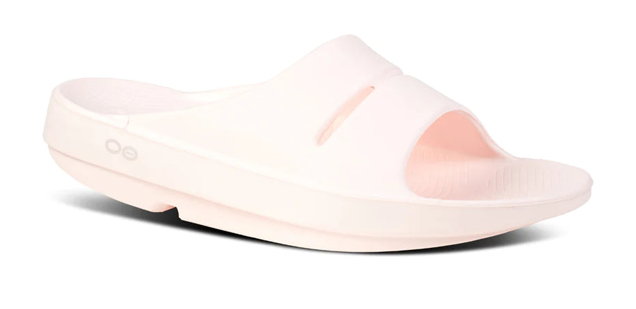 OOahh - Unisex by Oofos in light pink, agile OOfoam slide with impact-absorbing footbed for support and comfort, ideal for recovery and casual wear