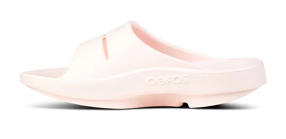 OOahh - Unisex by Oofos in light pink with OOfoam strap for impact absorption and support, ideal for recovery and casual wear