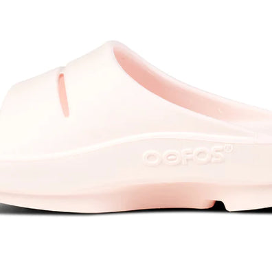 OOahh - Unisex by Oofos in light pink with OOfoam strap for impact absorption and support, ideal for recovery and casual wear
