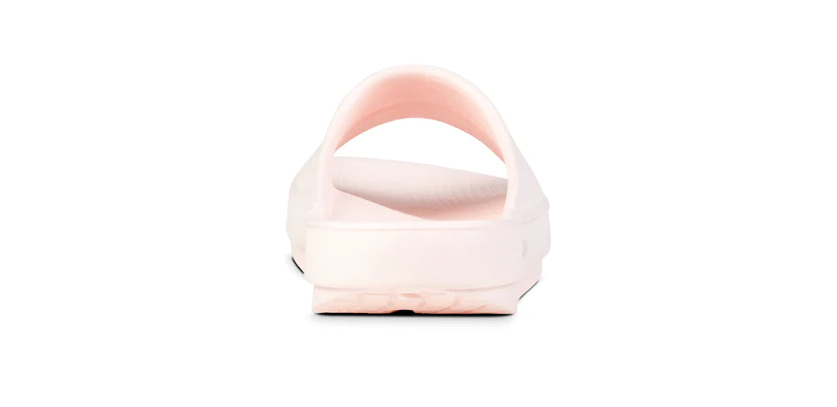 OOahh - Unisex by Oofos in light pink and white, soft OOfoam slides with impact absorption for comfort and support, ideal for recovery and casual wear