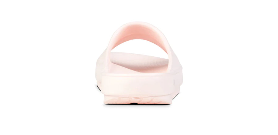 OOahh - Unisex by Oofos in light pink and white, soft OOfoam slides with impact absorption for comfort and support, ideal for recovery and casual wear