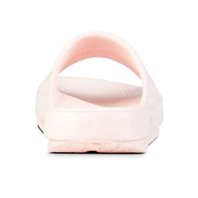 OOahh - Unisex by Oofos in light pink and white, soft OOfoam slides with impact absorption for comfort and support, ideal for recovery and casual wear