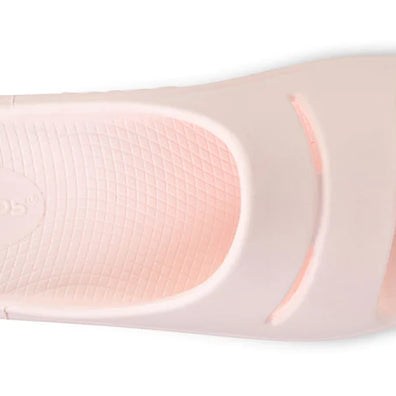 OOahh - Unisex by Oofos in light pink with OOfoam strap, impact-absorbing slides for comfort and support, ideal for recovery and casual wear