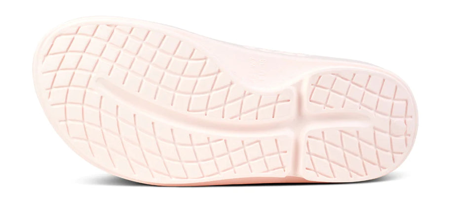 OOahh - Unisex by Oofos in light pink with OOfoam strap for impact absorption and comfort, ideal for recovery and casual wear