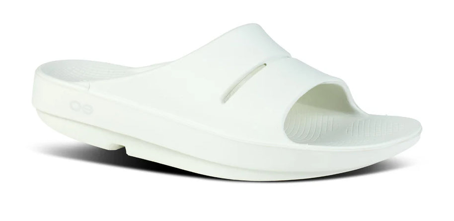OOahh - Unisex by Oofos in white, lightweight slides with OOfoam strap for impact absorption and comfort, ideal for recovery and casual wear