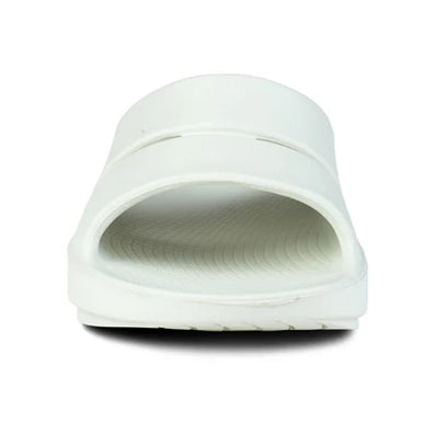 OOahh - Unisex by Oofos in white with agile OOfoam strap for superior impact absorption and enhanced comfort in slides