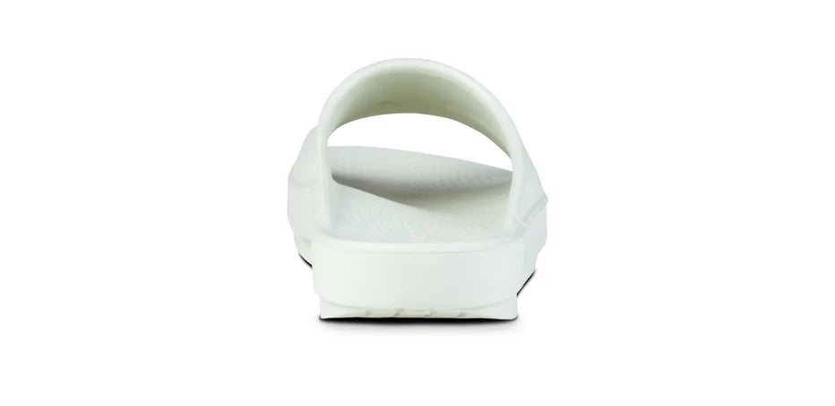 OOahh - Unisex by Oofos in white with agile OOfoam strap, impact-absorbing slides ideal for recovery and casual comfort