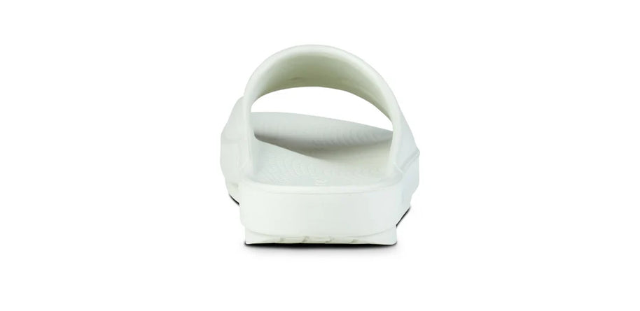 OOahh - Unisex by Oofos in white with agile OOfoam strap, impact-absorbing slides ideal for recovery and casual comfort