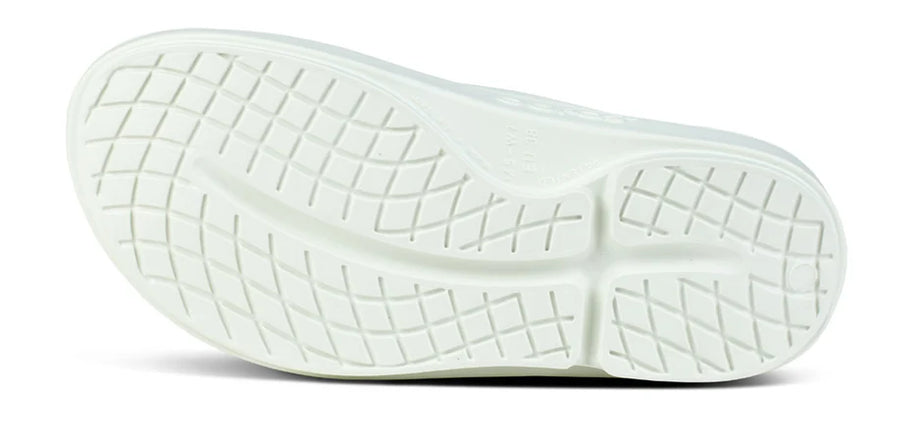 OOahh - Unisex by Oofos in white, lightweight slides with OOfoam strap for impact absorption and enhanced comfort, ideal for recovery and casual wear