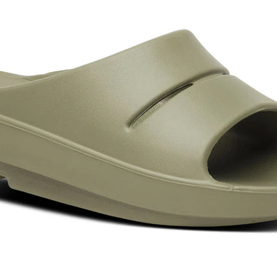 OOahh - Unisex by Oofos in olive green with OOfoam strap for impact absorption and support, ideal for recovery and casual wear