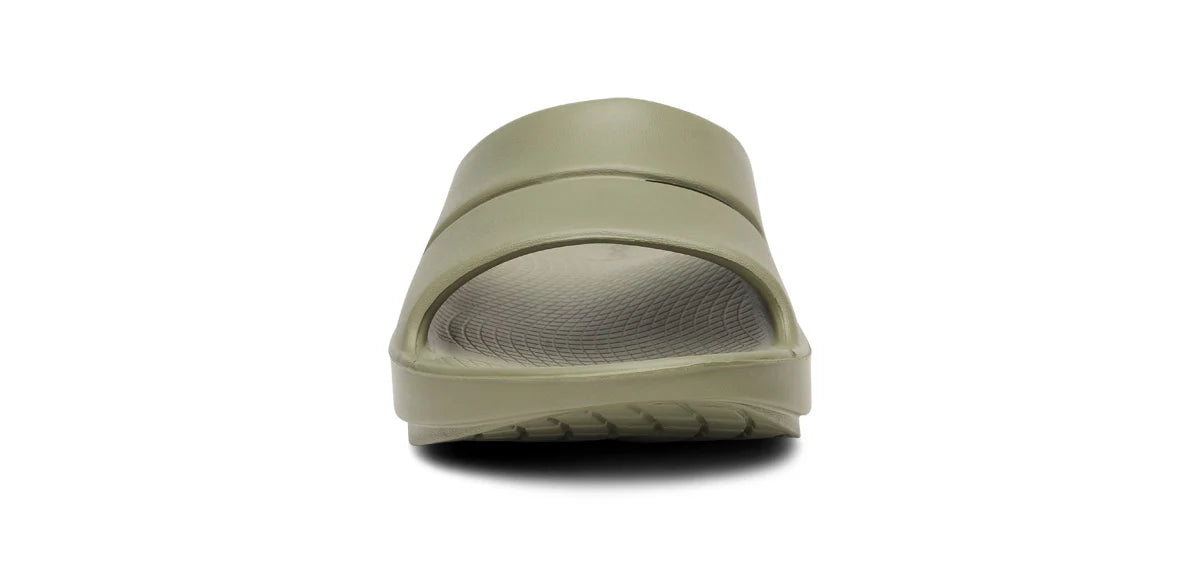 OOahh - Unisex by Oofos in olive green, lightweight slides with OOfoam strap for impact absorption and enhanced comfort