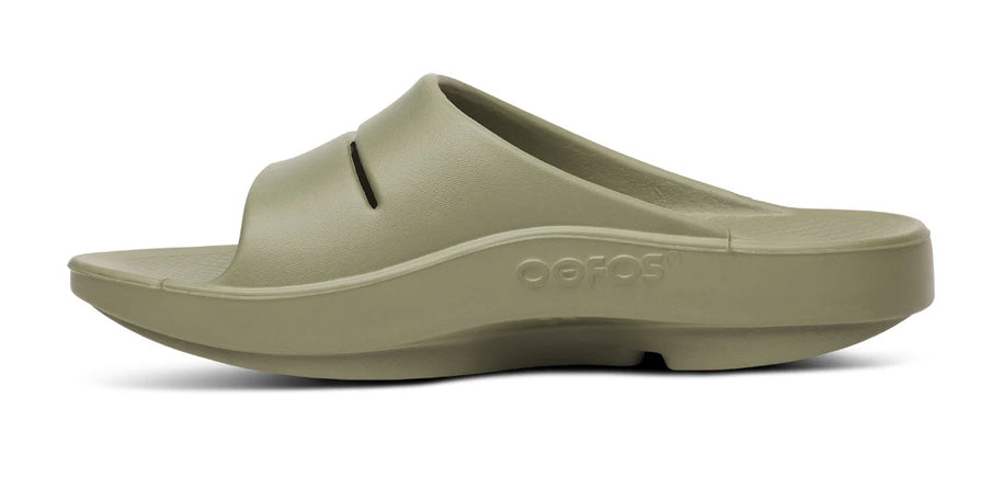 OOahh - Unisex in olive green by Oofos, lightweight slides with OOfoam strap for enhanced support and 37% more impact absorption.