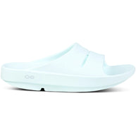 OOahh - Unisex by Oofos in light blue, comfortable slides with OOfoam strap for impact absorption and all-day support