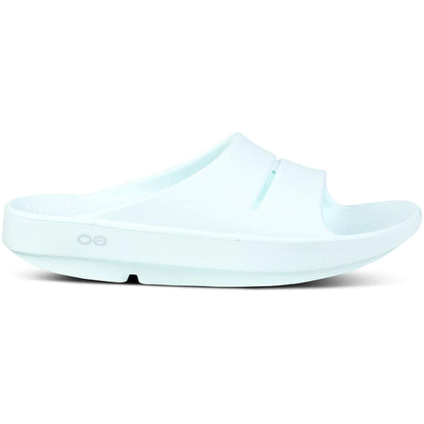 OOahh - Unisex by Oofos in light blue, comfortable slides with OOfoam strap for impact absorption and all-day support