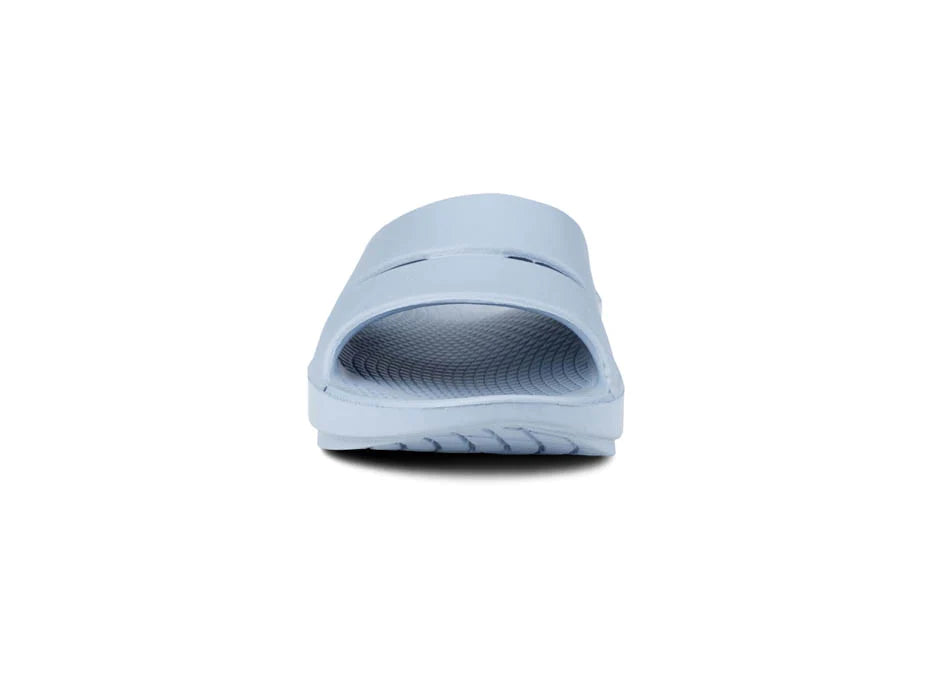 OOahh - Unisex by Oofos in light blue with agile OOfoam strap for support, impact absorption, ideal for recovery and casual wear