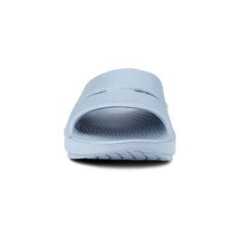 OOahh - Unisex by Oofos in light blue with agile OOfoam strap for support, impact absorption, ideal for recovery and casual wear