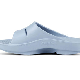 OOahh - Unisex by Oofos in light blue slide with agile OOfoam strap offering 37% more impact absorption and comfort