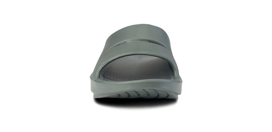 OOahh - Unisex by Oofos in grey with OOfoam strap for extra support and comfort, impact-absorbing slides ideal for recovery and casual wear