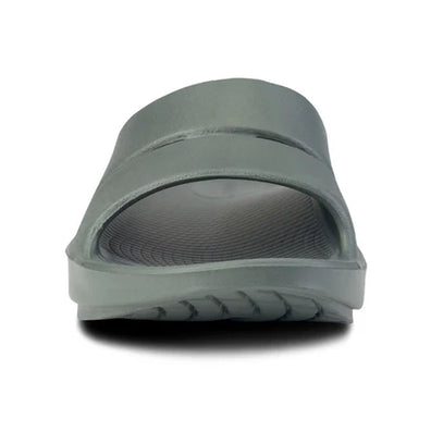 OOahh - Unisex by Oofos in grey with OOfoam strap for extra support and comfort, impact-absorbing slides ideal for recovery and casual wear