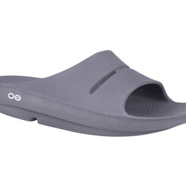 OOahh - Unisex by Oofos in grey, lightweight slides with OOfoam strap for impact absorption and comfort, ideal for recovery and casual wear