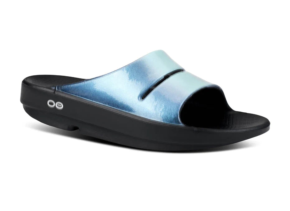 OOahh Luxe - Women by Oofos in light blue and black with agile OOfoam strap for comfort and support, ideal for casual wear and recovery.