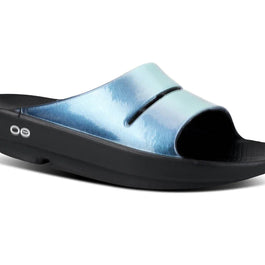 OOahh Luxe - Women by Oofos in light blue and black with agile OOfoam strap for comfort and support, ideal for casual wear and recovery.
