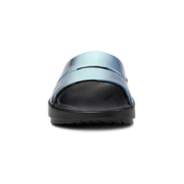OOahh Luxe - Women by Oofos in metallic blue with OOfoam strap for support and comfort, lightweight slides ideal for casual wear.