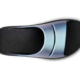 OOahh Luxe - Women by Oofos in metallic blue and black with agile OOfoam strap for support and comfort, ideal for recovery and casual wear