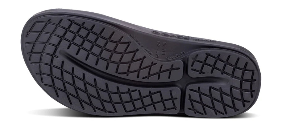 OOahh Luxe - Women by Oofos in black with agile OOfoam strap and hand-painted design, supportive slides for comfort and recovery