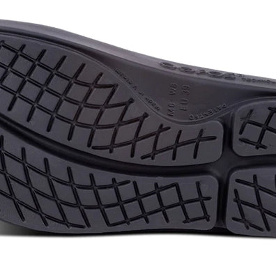 OOahh Luxe - Women by Oofos in black with agile OOfoam strap and hand-painted design, supportive slides for comfort and recovery
