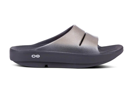 OOahh Luxe - Women by Oofos in grey with agile OOfoam strap, supportive and comfortable slides ideal for recovery and casual wear