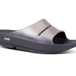 OOahh Luxe - Women by Oofos in metallic grey and black with agile OOfoam strap for added support and comfort, ideal for recovery and casual wear