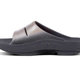 OOahh Luxe - Women by Oofos in metallic grey with agile OOfoam strap for support, comfort, and stylish recovery slides