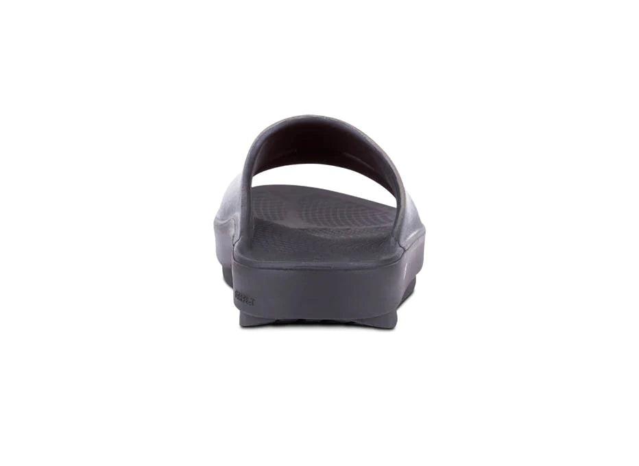 OOahh Luxe - Women by Oofos in black with OOfoam strap for support and comfort, lightweight slides ideal for recovery and casual wear