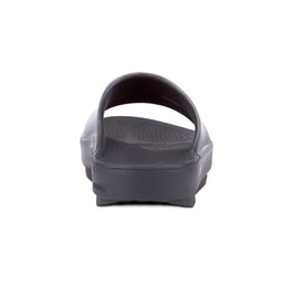 OOahh Luxe - Women by Oofos in black with OOfoam strap for support and comfort, lightweight slides ideal for recovery and casual wear