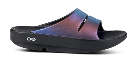 OOahh Luxe - Women by Oofos in iridescent blue and purple slides with OOfoam strap for comfort and support, ideal for recovery and casual wear