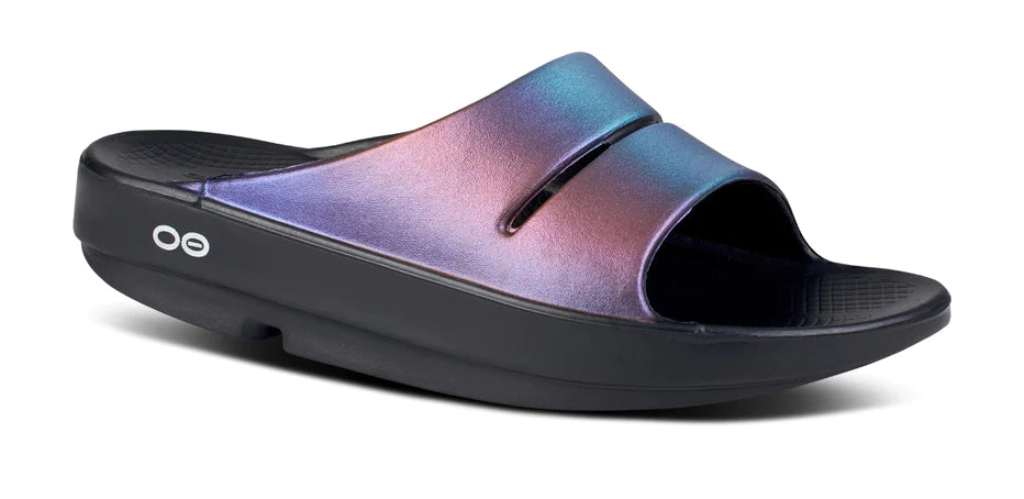 OOahh Luxe - Women by Oofos in iridescent purple and black, lightweight slides with OOfoam strap for support and comfort