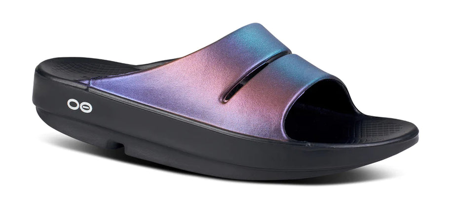 OOahh Luxe - Women by Oofos in iridescent purple and black, lightweight slides with OOfoam strap for support and comfort