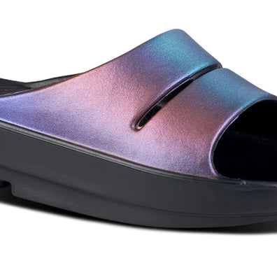 OOahh Luxe - Women by Oofos in iridescent purple and black, lightweight slides with OOfoam strap for support and comfort