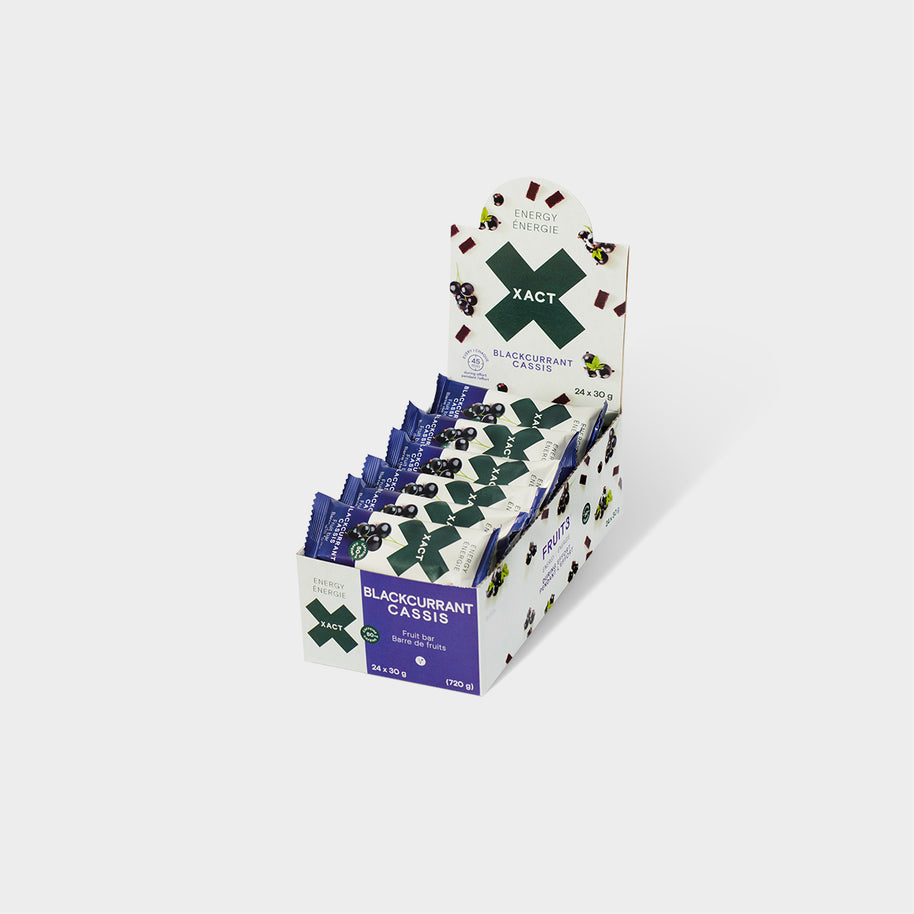 Display box of Xact Energy Fruit Bars in Blackcurrant, open carton with purple wrapped bars