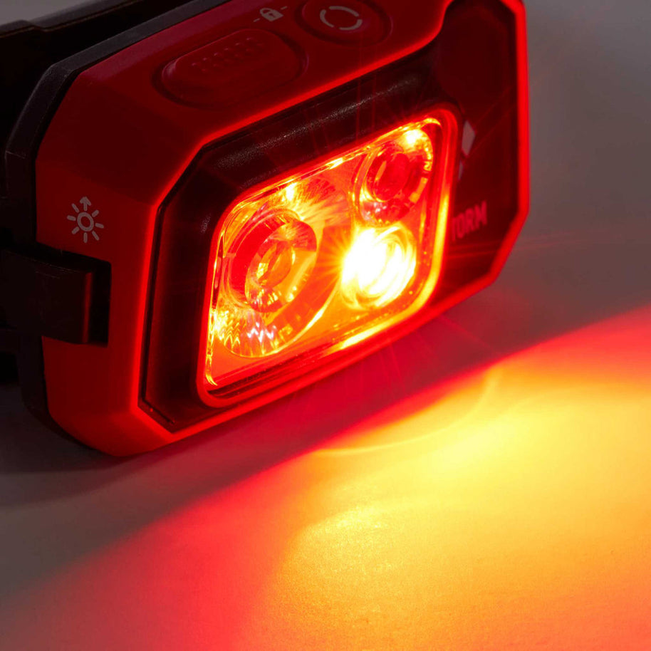 Storm 450 Headlamp by Black Diamond in red and black, waterproof dual-fuel headlamp with bright LED light for outdoor adventure