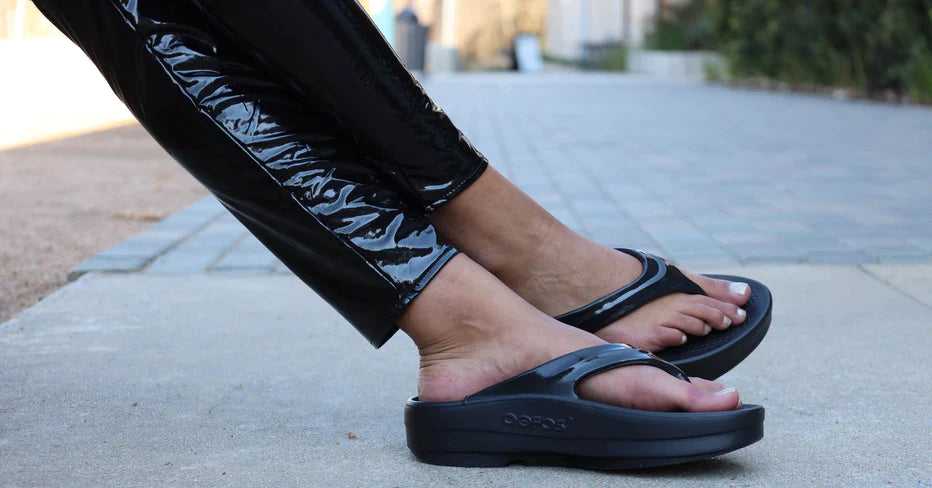 Oomega Oolala - Women by Oofos in black comfortable recovery sandal with OOfoam technology and patented footbed for active use